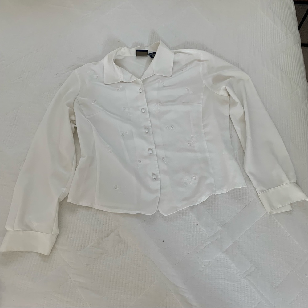 Detailed button up top